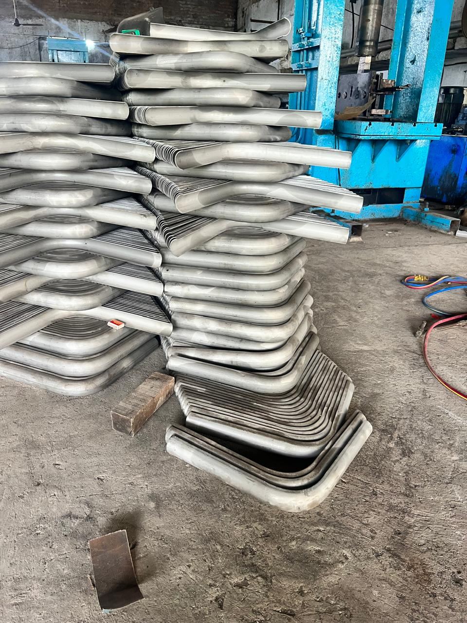 Bent boiler tube shields ready for shipment at Ruby Infra